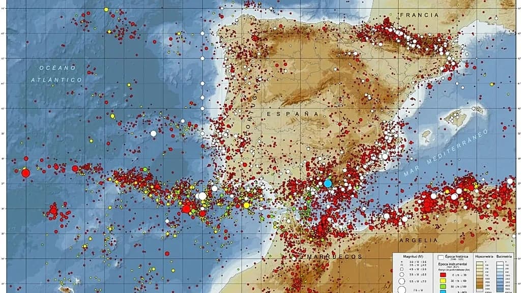 A seismic risk map of Spain marked with dots showing the location and intensity of historical earthquakes
